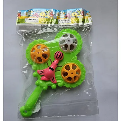 Hard plastic toy baby rattle which includes balls with rattling elements, and pink seal figurines attached to the toy.