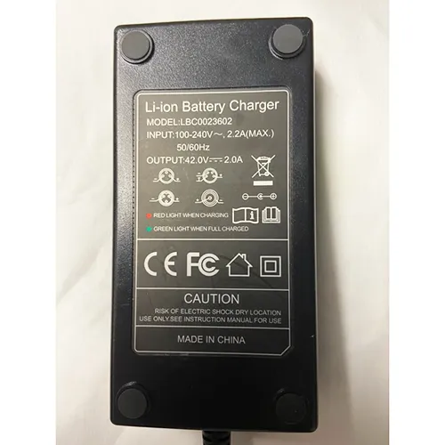 Black lithium-Ion battery charger with a power indicator light. Sold as a standalone replacement charger and as an accompanying electrical accessory supplied with 'Fiido' e-bikes. The charger has a two pin (Europlug) affixed. Adaptor included. Product sold online.