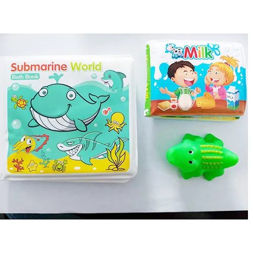 Bath toy set, including two soft plastic books and a plastic crocodile figurine.