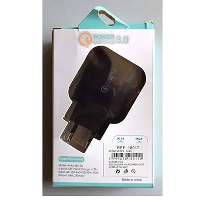 USB charger with black plastic cover, integrated mains plug and four USB-A sockets.