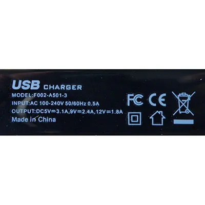 USB charger with black plastic cover, integrated mains plug and four USB-A sockets.