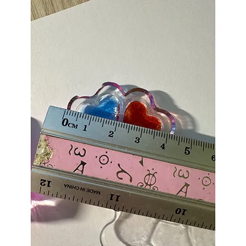 Plastic doll with accessories such as artificial nails, nail polish and a purse.