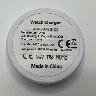 White charger plate with USB/USB-C connection cable. Intended for smartwatches.