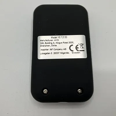 Black plastic remote control duplicator with four buttons.