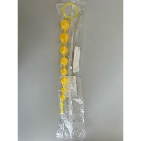 Yellow plastic orgasm balls. Product sold online, in particular via TEMU.