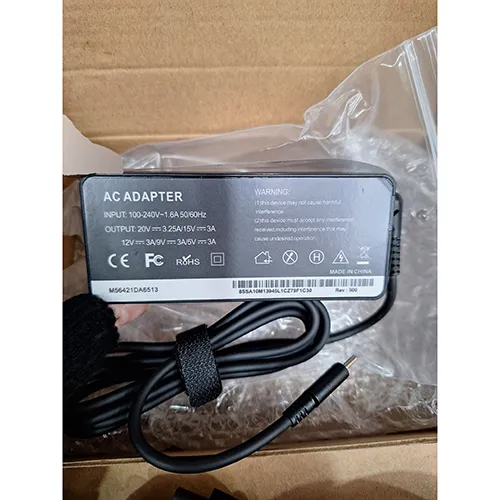 A black AC adaptor charging cable with USB-C plug.