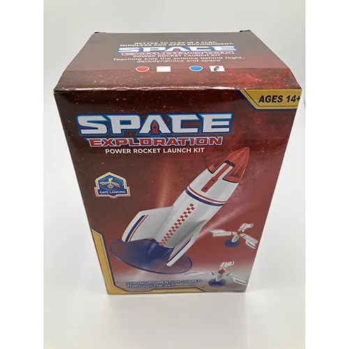 White foam toy rocket, approx. 30 cm in height, fitted with a red plastic propeller base powered with a USB cable including a remote control and a blue launch pad.