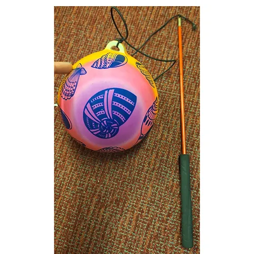 Plastic ball, attached to a rod.