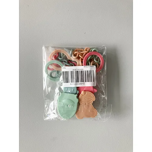 Soother holder with clip..Product sold online, in particular via Amazon (ASIN: X001WL2B5B).