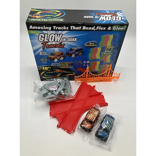 360 pieces rail car set. Includes 549 cm of luminescent tracks, decorative trees and traffic signs, a red four-way ramp and two electric cars.