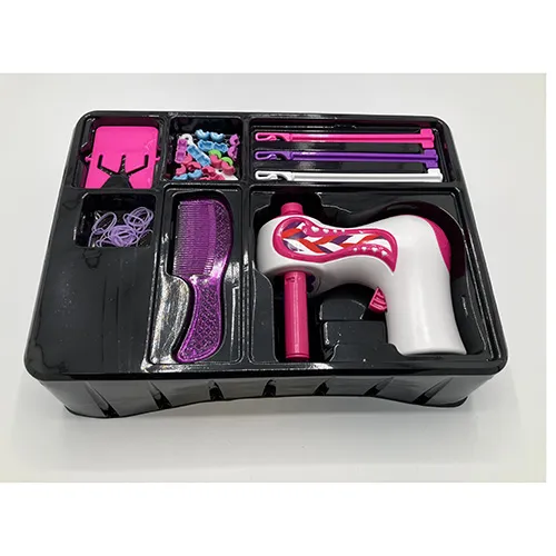 Toy hair styling tools including an electrical braiding machine (15x15 cm), a comb, hair pearls, rubber bands.