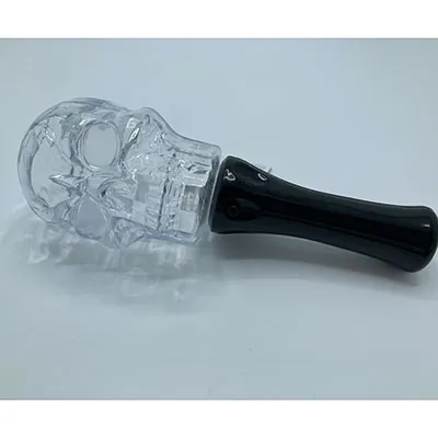 Halloween torchlight, approximately 35 cm in height. Transparent skull-shaped bulb with a black grip containing battery compartment and electronics.