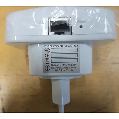 White WiFi repeater.