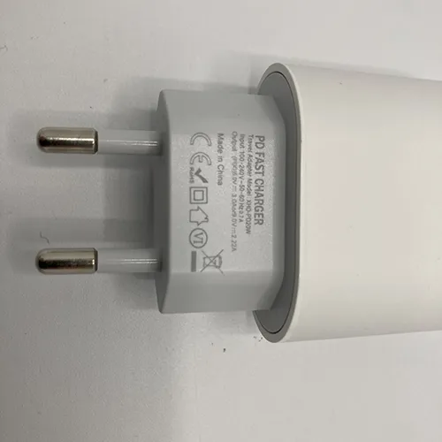 White 20W power adaptor with USB-C charging cable.