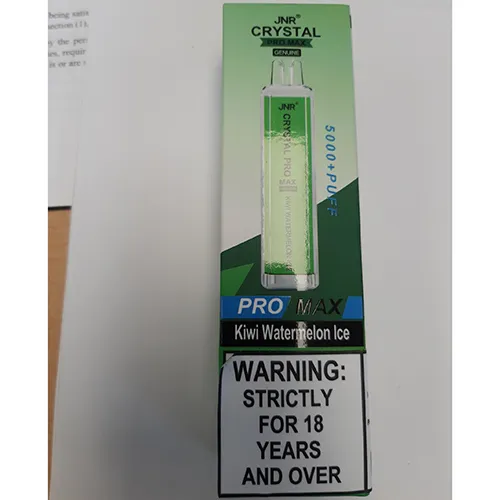 A green disposable e-cigarette within a plastic wrapper