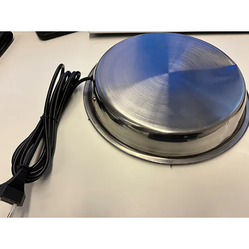 Round metal base with LED light and mains cable. Product sold online, in particular via eBay (Unique product identifier: 355172493481).