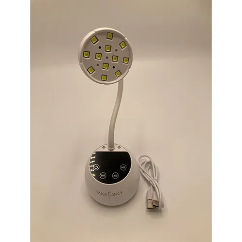 UV led nail lamp with charging cable. Product sold online, in particular via missfancy.se.