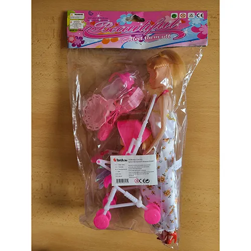 Plastic doll of 26 cm with hair in a ponytail in a dress with flowers and plastic accessories and red shoes.