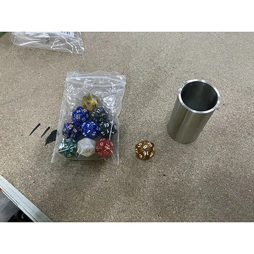 Set of dice consisting of 12-sided coloured dice. Product sold online, in particular via Temu (Unique product identifier: 601099608795038).