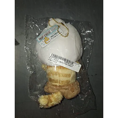 Plush toy, in the shape of a beige animal with a white hood, a pink bow and a metal chain. Product sold online, in particular via AliExpress.