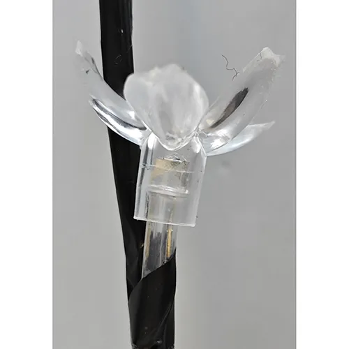 Tree-shaped light, with non-replaceable LED light sources in the shape of a flower.