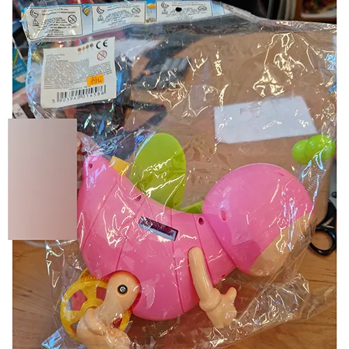 A bee-shaped push along toy, made of plastic material.