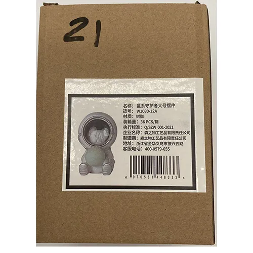 Small night lamp shaped as an astronaut puppy.