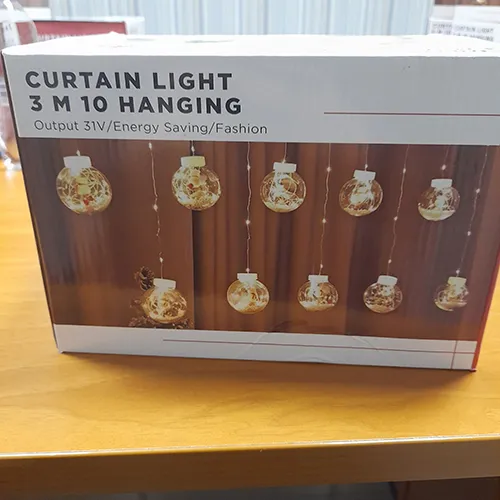Ornamental light chain with transparent plastic balls containing 150 non-replaceable LED light sources.