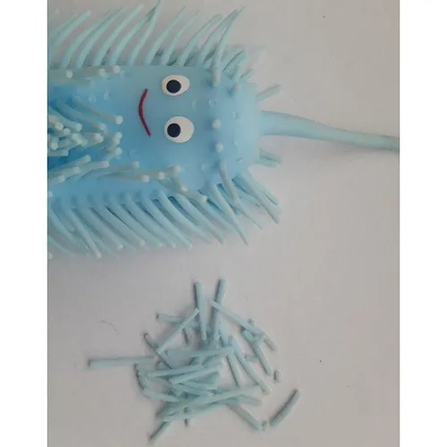 Anti-stress toy, in the shape of a blue caterpillar, made of soft plastic. Inside the toy is a plastic ball that lights up when hit.