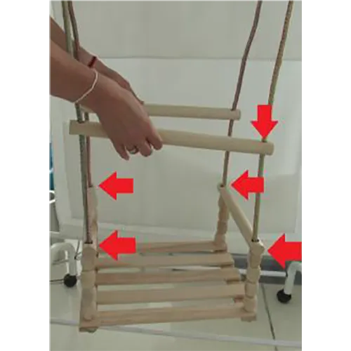 Children's hanging swing, with a structure consisting of wooden movable partitions through which a rope passes,  equipped with a seat with a barrier. The hanging system consists of a rope anchored in each corner of the swing and ends in two connectors with rings.