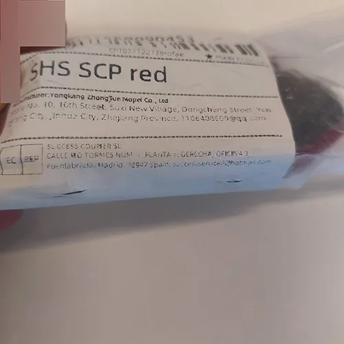Orange-coloured brake pads. Product sold online, in particular via AliExpress.