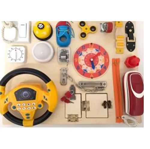 Wooden activity board with various stimulation toys including a clock face with hands, a telephone with buttons, a yellow fidget spinner and a battery operated steering wheel with buttons. Product sold online, in particular via Amazon.