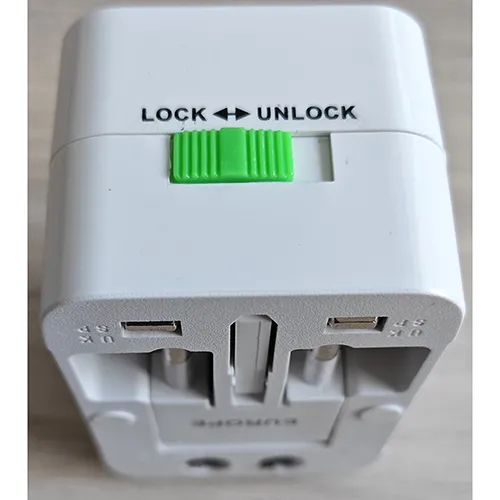 Universal white travel adaptor.