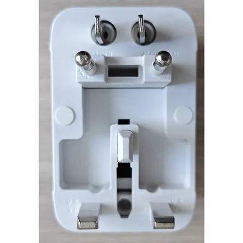 Universal white travel adaptor.
