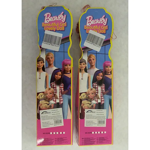 Plastic toy dolls with curly hair wearing a swimsuit.
