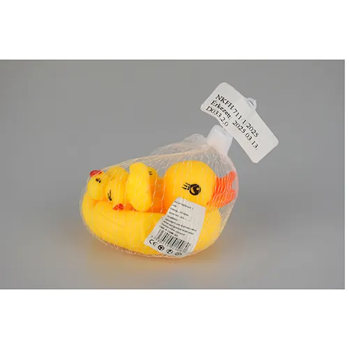 Plastic duck bath toy set, consisting of a larger whistling duck and three smaller ducklings.