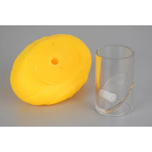 Plastic duck bath toy set, consisting of a larger whistling duck and three smaller ducklings.