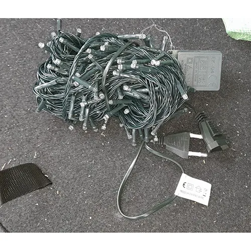 Lighting chain consisting of 200 LEDs, a flashing unit with IP44 marking, a flat plug and a flat, stackable socket.