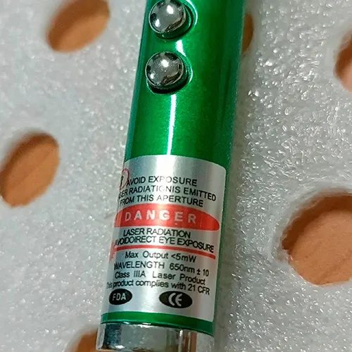 Laser pointer with dual light and laser function, powered by three button batteries.