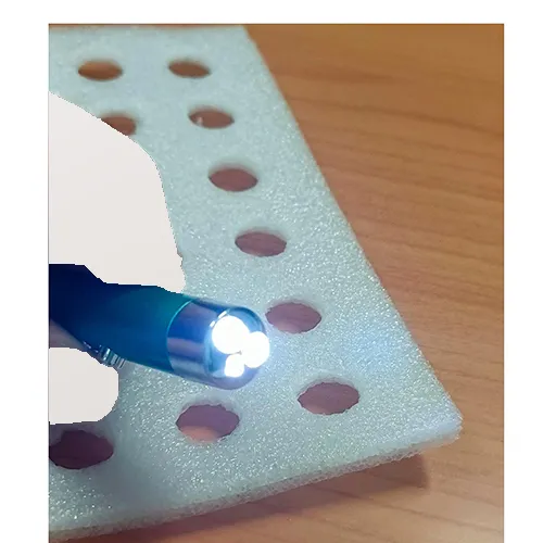 Laser pointer with dual light and laser function, powered by three button batteries.