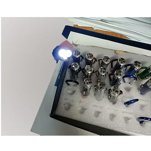 Laser pointer with dual light and laser function, powered by three button batteries.