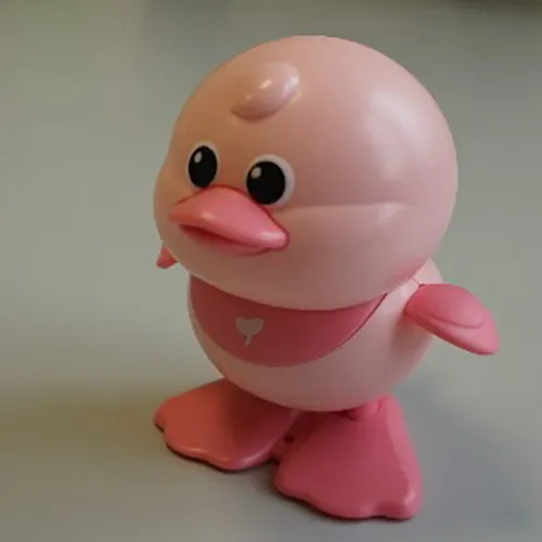 Wind-up plastic toy. Product sold online, in particular via SHEIN, with product identification number: sl2411253255422433..