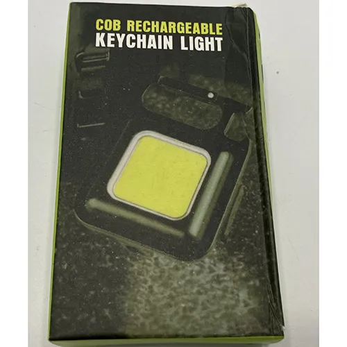 Carabiner fastened flashlight, about 4x4 cm intended to function as a bottle opener. Product sold online, in particular via mylar.se.
