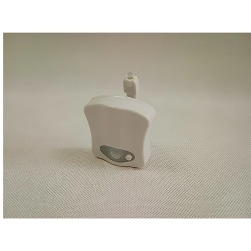 White battery-operated LED toilet bowl light. Product sold online, in particular via www.cool-mania.eu.