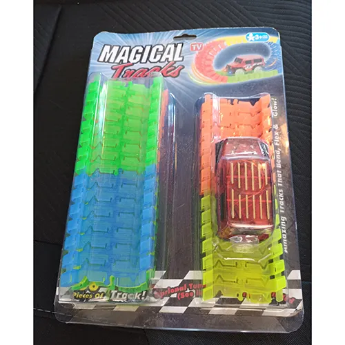 Battery-operated plastic toy in the shape of a car provided with a plastic track, light and AA batteries.