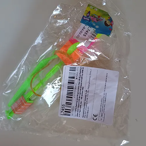 Toy slingshot with LED light. Product sold online, in particular via AliExpress.