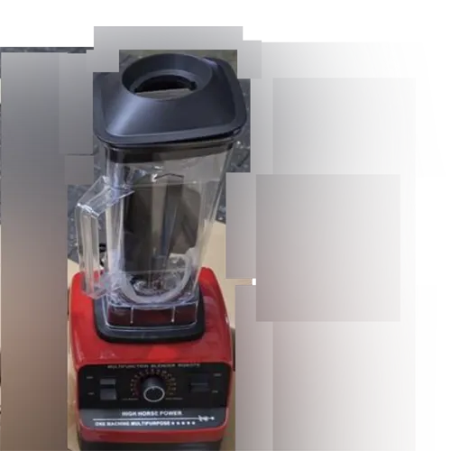 An electronic red kitchen blender with detachable pouring cup.
