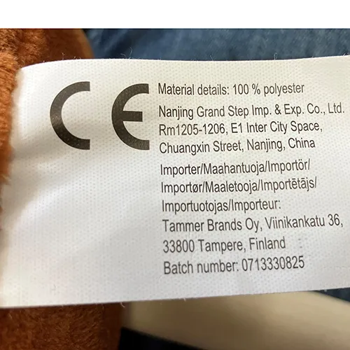 Dark brown and white and black hobby horses with a wooden stick. Both horses have a black mane and a black bridle.