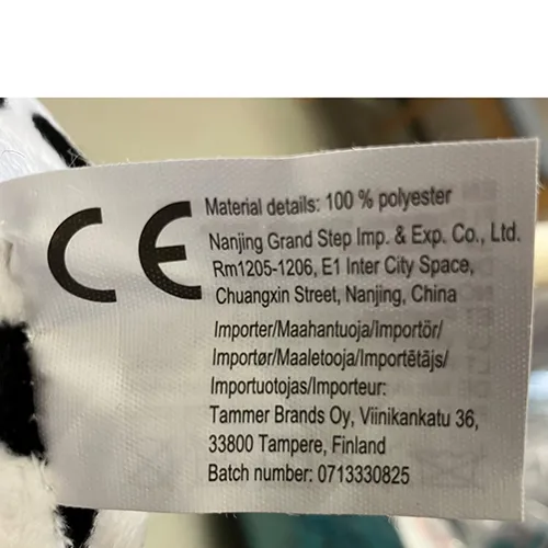 Dark brown and white and black hobby horses with a wooden stick. Both horses have a black mane and a black bridle.