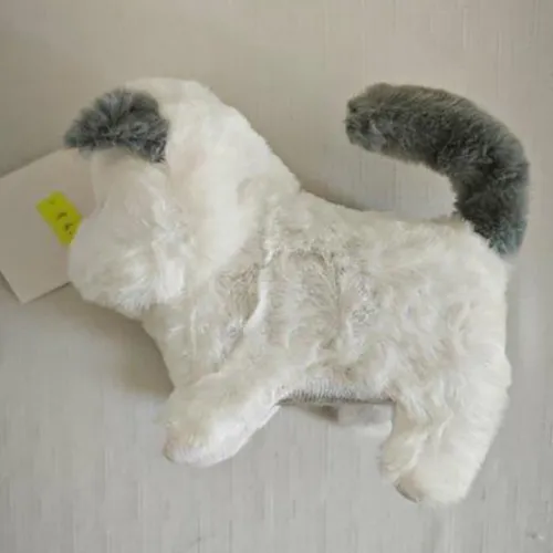 Plush toy in the shape of a cat, available in various colours. The toy is sold in various colours. The toy is battery-operated with 2 AA batteries.